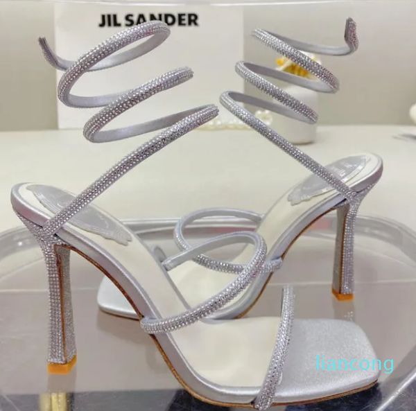 2023 Sandalen mit Kristallverzierung, spiralförmige Schlangenschwanz-Sandalen, zwirnende Strass-Sandalen für Damen, hochwertige silberne Stiletto-Absätze