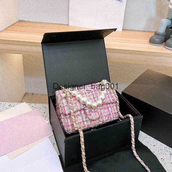 Bolsas de designers bolsas de ombro de bolsas femininas Luxurys pérolas de lã de lã 23sss Mulher mensageiro de bolsa interfaces