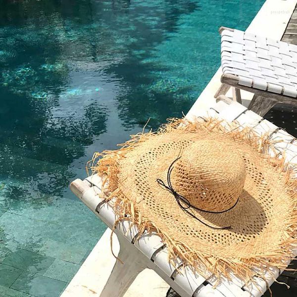 Chapéus largos da borda King Wheat Woven Terby Out Raffia Straw Hat Women Beach Big moda Moda ao ar livre Protetor solar em toda a localização em todo