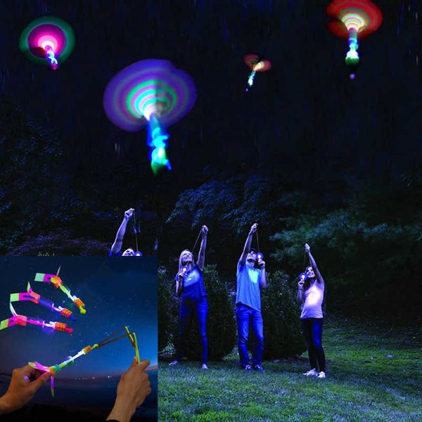 LED Light Up Up Luminous Flying Slingshot Toys de levitação noturna ao ar livre para crianças crianças