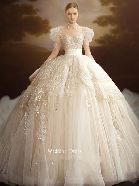 Abiti da sposa di lusso Dubai Ball Gown Manica lunga Collo in cristallo trasparente Abiti da sposa con applicazioni di perline di cristallo Abiti da sposa con paillettes in pizzo Vestido De Novias