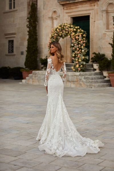 Abiti da sposa sexy a sirena taglie forti Bohemian con apertura sul retro Fiori di pizzo Applique maniche lunghe Sweep Train Sheer Scollo a V Beach Bridal252n