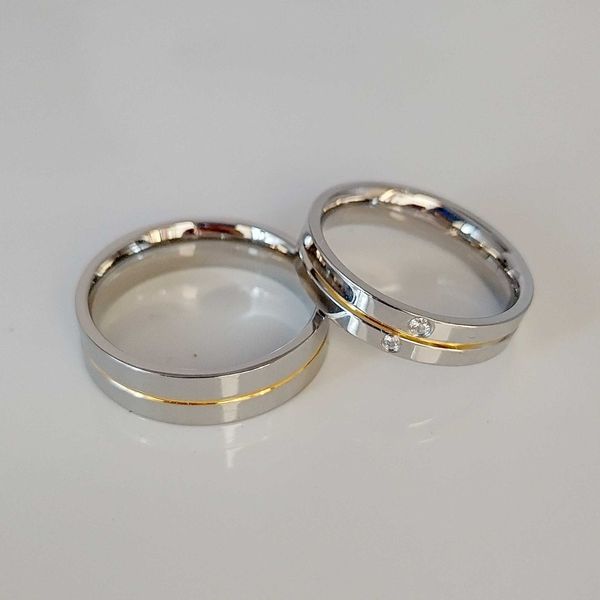 Band Rings de alta qualidade Western italiano coreano 18k Praado de ouro aço inoxidável aço de jóias de casamento pares de casais para homens e mulheres AA230306