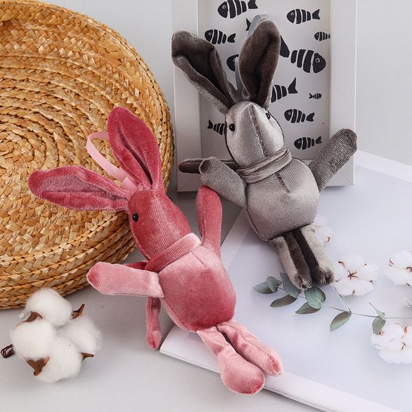 Wishing Rabbit Doll Ciondolo in peluche con coniglio a gambe lunghe in velluto coreano Bambola eterna in confezione regalo con bouquet di fiori