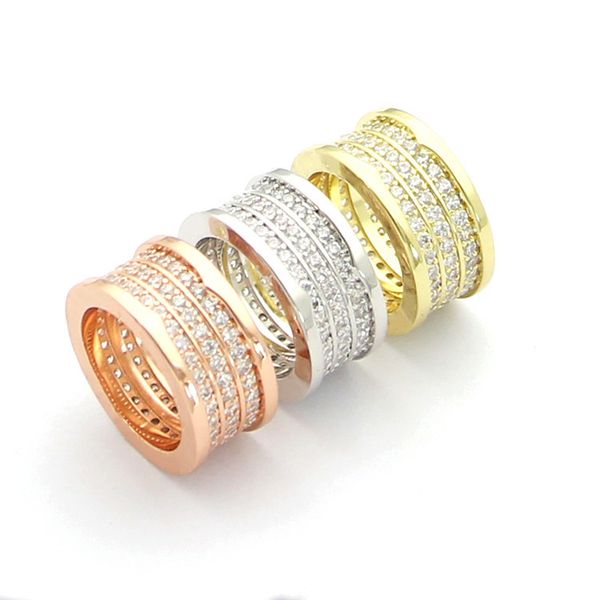 Europa America Fashion Style Anello Uomo Donna Donna Acciaio al titanio Inciso B Iniziali Impostazioni Tre cerchi Anelli con diamanti per gli amanti US6-US9