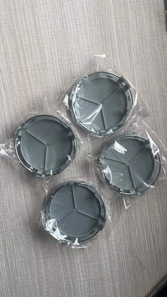 100pcs / lote 75 mm Crachás de carro em prata Acessórios externos Tampa do cubo central da roda para W212 W211 W210 W205 CLA GLC C200 ACESSÓRIOS DE CAR