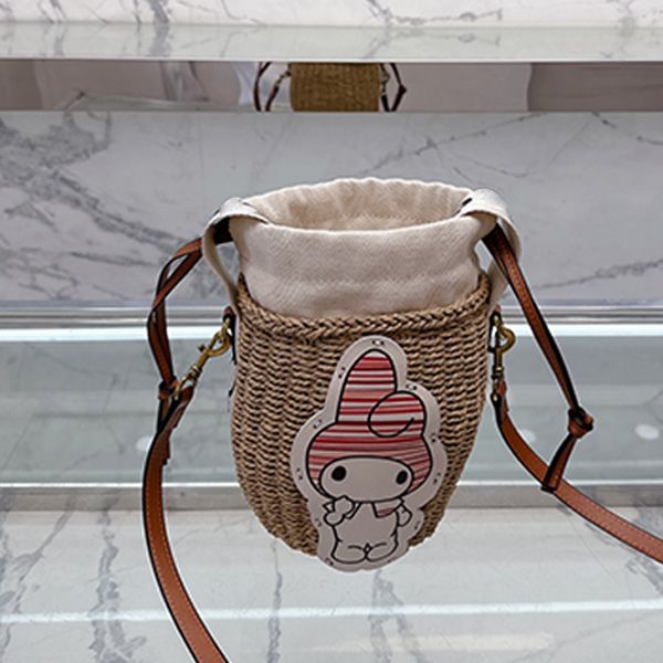 Bolsa de designer bolsa de palha de palha nova moda portátil sacos de balde portátil estilo coelho Mensageiro Rattan Bag Cesto de cartoon Bolsas de verão Bolsas de verão