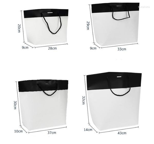 Pedra de bolsas de papel de logotipo personalizado com alças 100pcs para vestuário de varejo Presente sapatos de papel de papel de papel branco Diy SN2968