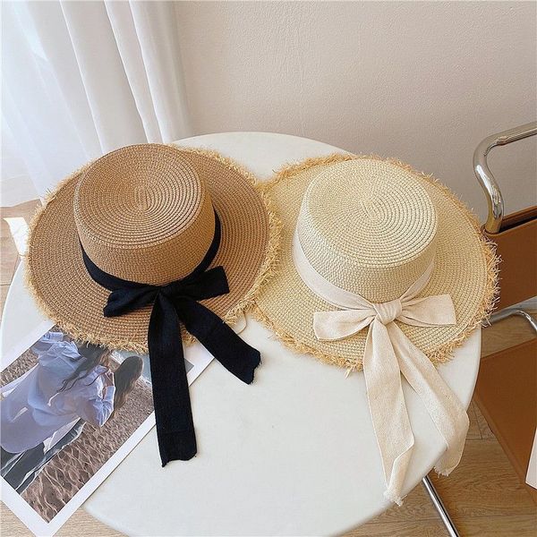 Yüksek kaliteli rafya hasır şapka yaz yay plaj şapkaları güneşlik düz üst kova şapkaları dokuma vizör şapka kapakları kadınlar için