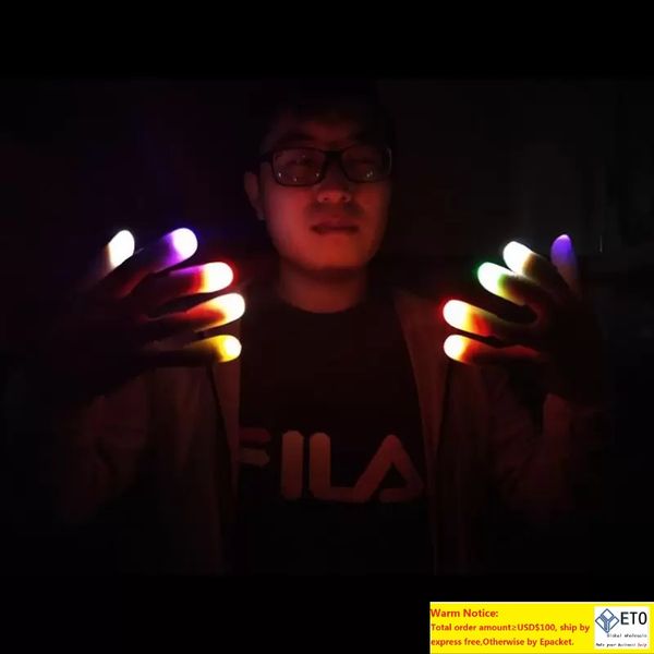 Divertente LightUp Pollice Dita Puntelli per trucchi magici Luce a LED Lampada da dito lampeggiante Novità incredibili giocattoli per bambini
