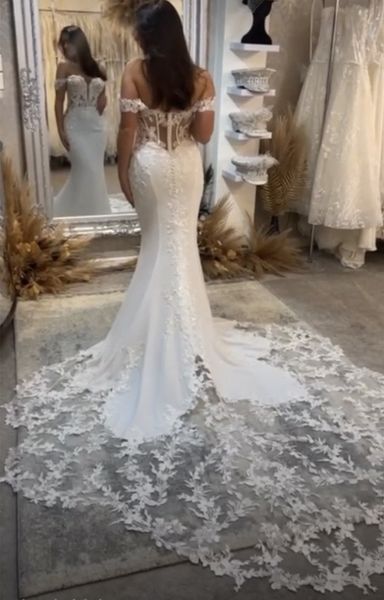 2023 Abito da sposa in pizzo a sirena Boho Treno lungo Coda di pesce Corsetto sexy con spalle scoperte Abiti da sposa da spiaggia bohémien Abiti da sposa estivi senza maniche