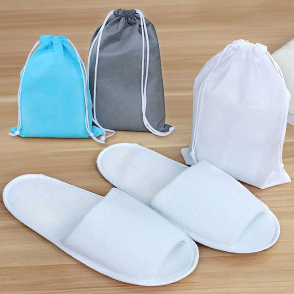 Slippers Slippers dobráveis ​​portáteis para homens Mulheres viagens de algodão não dispositáveis ​​com bolsa de armazenamento Hotel Home Slipper Indoor Z0317