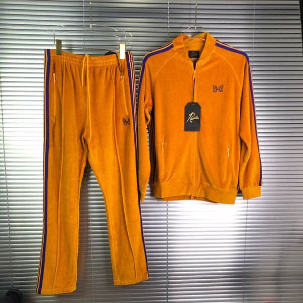 Pantaloni da uomo Pantaloni sportivi di velluto giallo con aghi AWGE Uomo Donna 1 Pantaloni sportivi con ricamo a farfalla di alta qualità Pantaloni autunno moda 230317