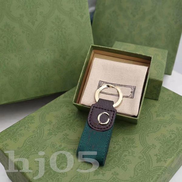 Chaves de chaves unissex artesanais Chain Chain Chain Men masculino Bolsa de couro marrom encantos de acessórios de ouro banhados Cartão Carta do chaveiro PJ055 C23