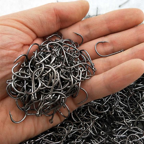 Ganchos de pesca 100-200pcs de alto carbono peixe gancho de peixe eficiência farpada 3# -12# FishHooks com hole gabarito carpa de pesca com folha de pesca worm peca tackle p230317