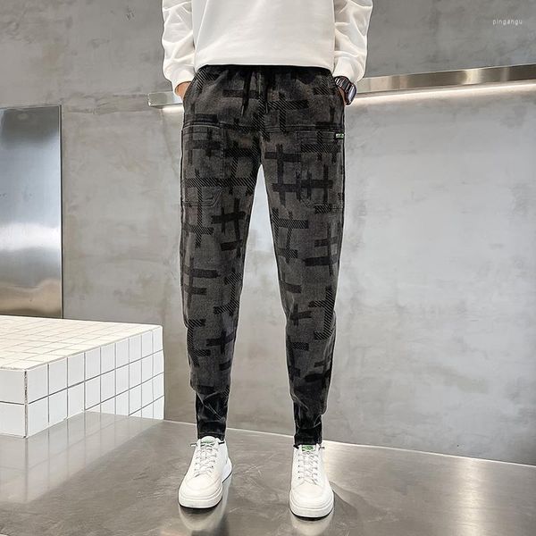 Jeans da uomo 2023 pantaloni moda da uomo primaverili e autunnali patchwork coreano stampa coulisse elastico casual