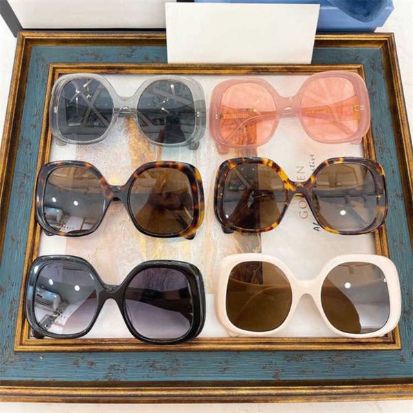 Óculos de sol femininos de designer de luxo masculinos Anos de pratos irregulares da rede anti-ultravioleta