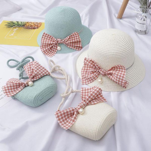 Cappelli 2023 Piccola borsa fresca per bambini Protezione solare Ragazza Estate Spiaggia Bowknot Perla Onda Cappello di paglia Bambini Cappellini da sole per bambini HT08