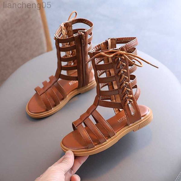 Сандалии Сандалии Лето 2022 Girls Gladiator Sandals Cross Cross Cross Deby Kids Casual Shoe Child Girl Roma Lace Up High Top Sandalias W0327