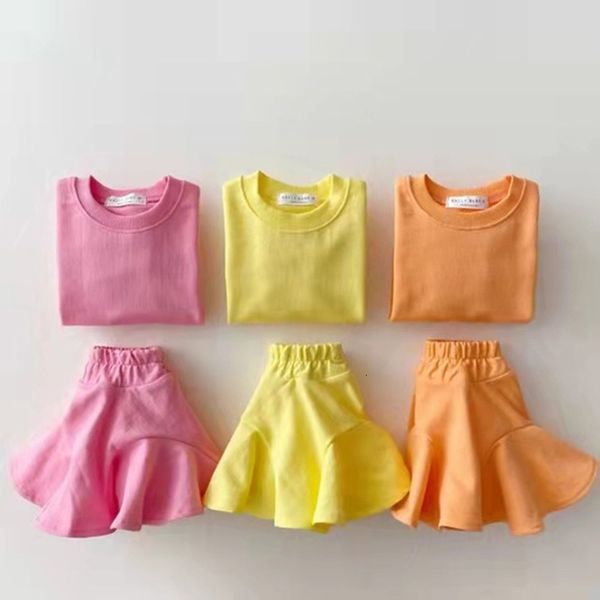 Set di abbigliamento 2023 Set di vestiti estivi per ragazze Colore della caramella Felpe a maniche lunghe Gonne Bambino 2 pezzi Abiti 15 anni Bambini Infant Girl Outfit 230327