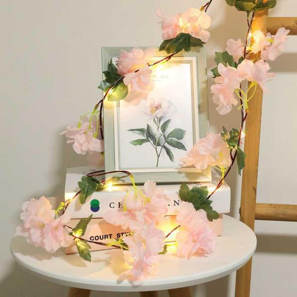 Ghirlande di fiori decorativi Ghirlanda di Natale a LED Simulazione Lampada in filo di rame in rattan Stringa di piante Casa Vacanza Matrimonio E Decorazione dell'anno