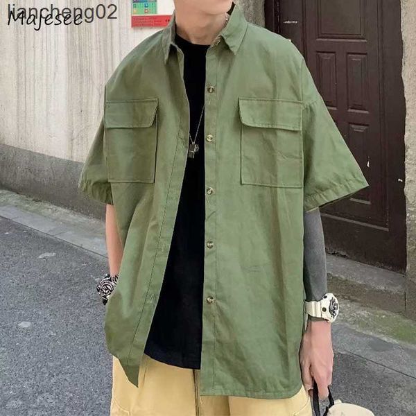 Camicie casual da uomo Cargo Camicie a maniche corte Uomo Causale Solido Harajuku Vintage Semplice Tutto-fiammifero Basic Top Uomo Tattico militare Tasche multiple Nuovo W0328