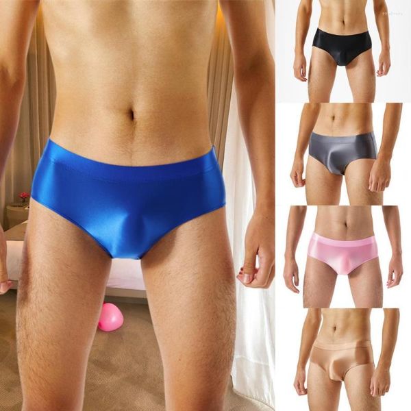 Mutande Slip da uomo Mutandine Tinta unita Liscio elasticizzato Senza cuciture Lucido Intimo Sexy Un pezzo Moda Abbigliamento maschile