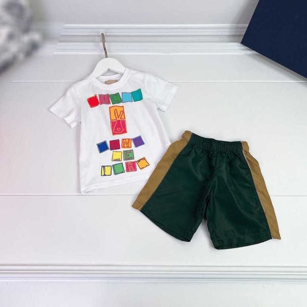 Conjunto infantil 23ss conjunto de shorts para meninos ternos infantis designer gola redonda algodão puro impressão de logotipo colorido emenda de manga curta shorts terno roupas infantis de alta qualidade a1