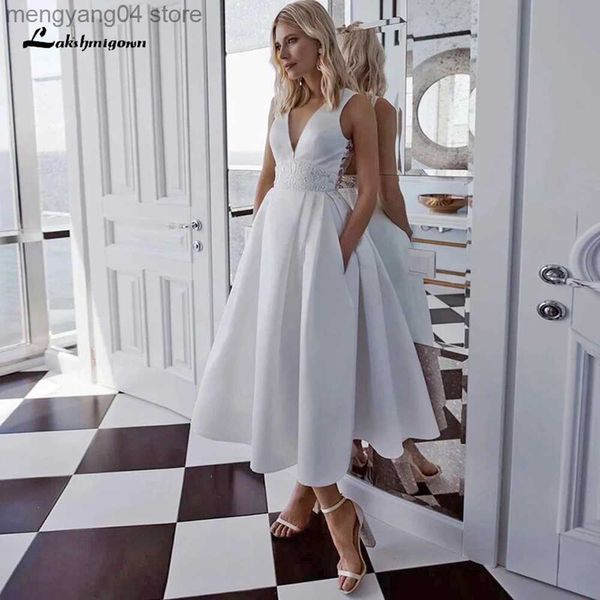 Abiti da festa Carino abito da sposa corto bianco avorio con scollo a V Abiti da sposa vintage lunghezza tè con tasche Abiti da sposa linea A 2023 Vestidos De T230502