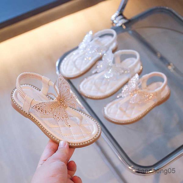 Sandali 2023 moda estiva scarpe con fiocco con strass per bambini ragazze scarpe da principessa appartamenti morbidi sandali da spiaggia per bambini