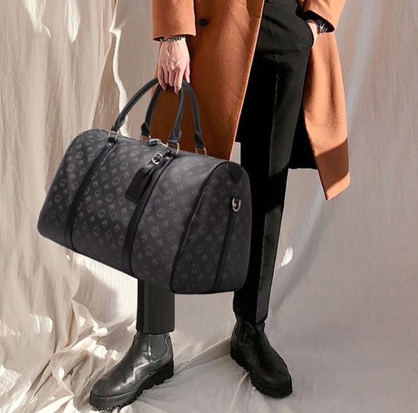 Yüksek kaliteli tasarımcı çanta erkekler duffel çanta moda tasarımcısı kadınlar seyahat çantası poker siyah çiçek bagaj çanta çanta büyük kapasiteli spor çantalı çanta debriyaj