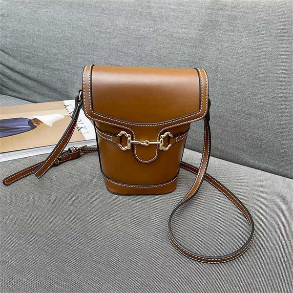 Bolsas início da primavera novo versátil balde pequeno saco moda versátil saco do telefone móvel portátil leve um ombro crossbody