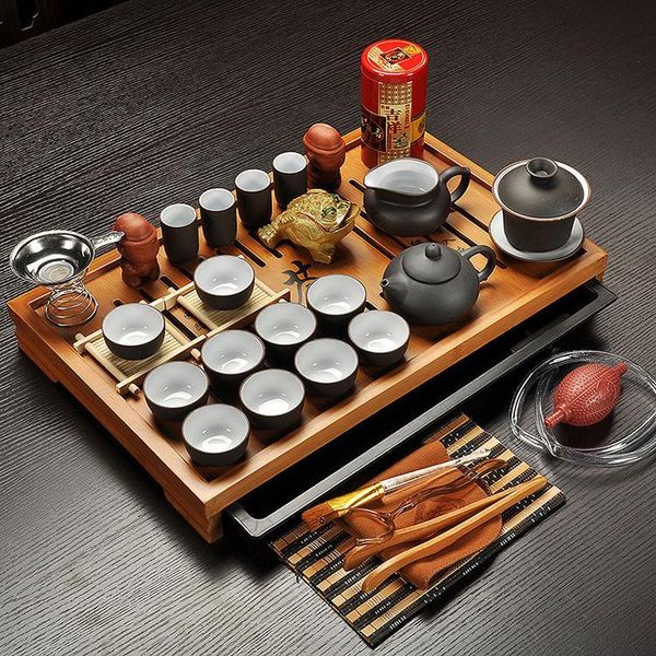 Articoli per il tè Jingdezhen Argilla Viola Kung Fu Set da tè Bicchieri Tazza da tè Zuppiera Infusore Cerimonia del tè cinese con tavolo da tè Gaiwan Chahai