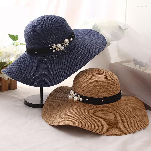 Cappelli a tesa larga HT1163 Sole estivo di alta qualità per le donne Solido a tesa larga nero bianco floscio con perle Cappello da spiaggia da donna