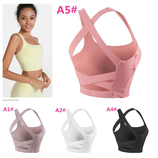 Nuovo look top alla moda Completi da allenamento alla moda Reggiseni sportivi da donna Imbottito con spalline incrociate sul retro Reggiseno sportivo senza cuciture a medio impatto Top corto da allenamento