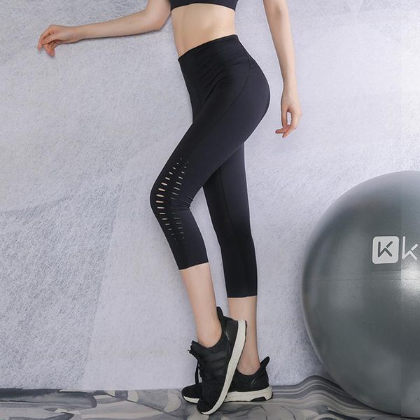 Pantaloni attivi Estate Donna Yoga Vita alta Controllo della pancia Sport Crop Leggings Capris elastici Ragazze Scava fuori Palestra Fitness Collant da corsa