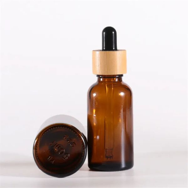 Flacone contagocce in vetro ambrato con coperchi in bambù Bottiglie per oli essenziali Fiale per campioni per liquidi cosmetici per profumi all'ingrosso