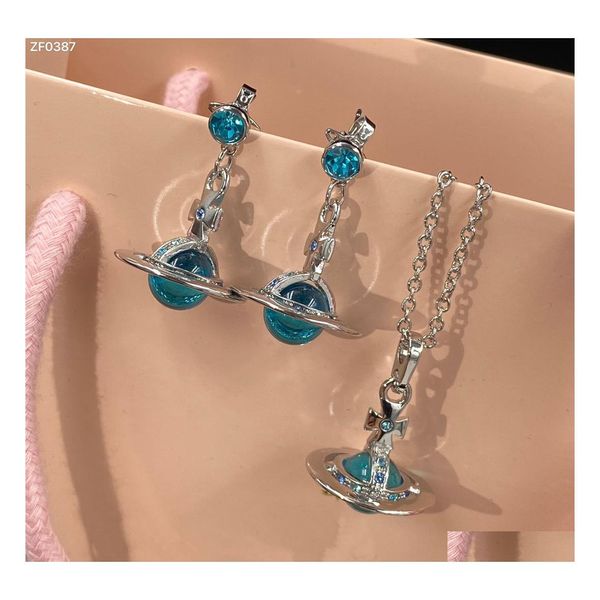 Set di gioielli da sposa Lussuose collane da donna Bangle Ear Studs Collana Bracciali Orecchino con ciondolo pianeta di cristallo blu Dhtbe occidentale