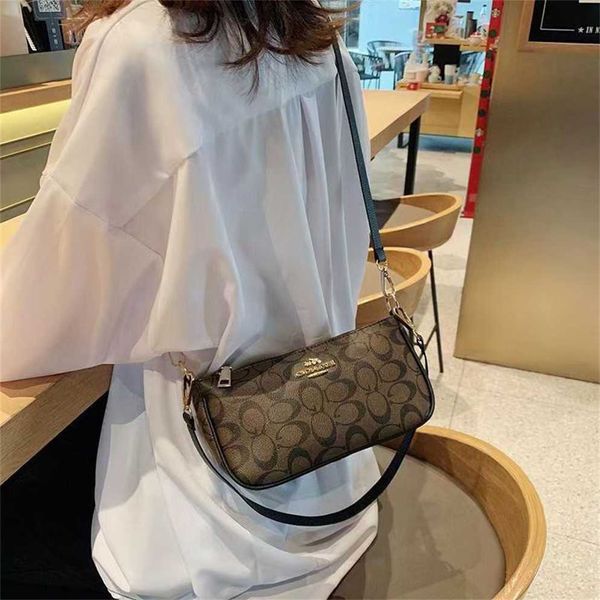 Bolsas baratas à venda Baobao Feminina nova bolsa de celular de moda impressa pequena quadrada versátil um ombro crossbody