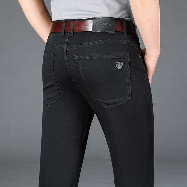 Jeans da uomo Primavera Estate Uomo Regular Fit Stretch Tinta unita Nero Sottile Classico Business Casual Pantaloni in denim di cotone Pantaloni di marca maschile 230509