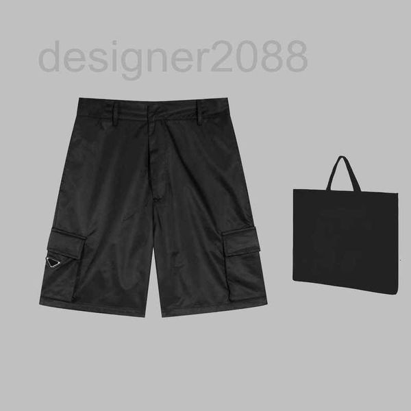 Мужские шорты Дизайнер 2023 Новый стиль мужские короткие брюки улицы роскошные летние брюки Высококачественные импортные нейлоновые ткани вышитые значки украшения брюки AM91