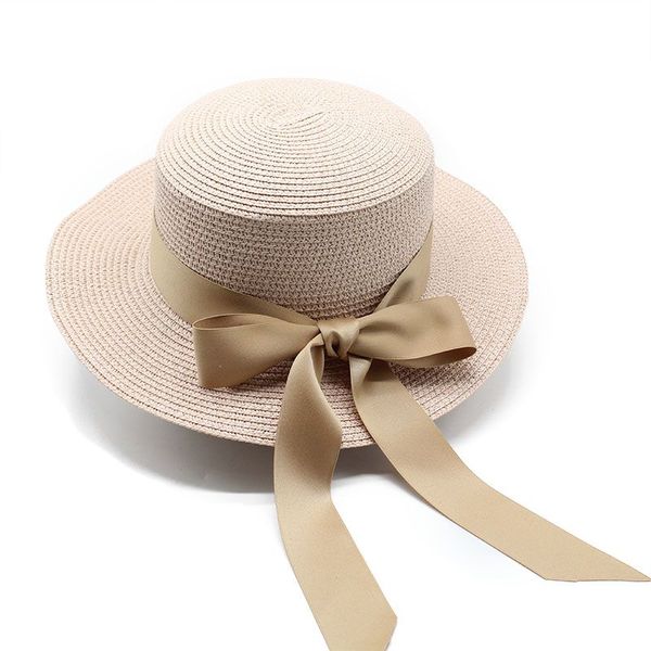 New summer beach cappello di paglia a tesa piatta cappello da sole da donna con fiocco in paglia e cappello da sole