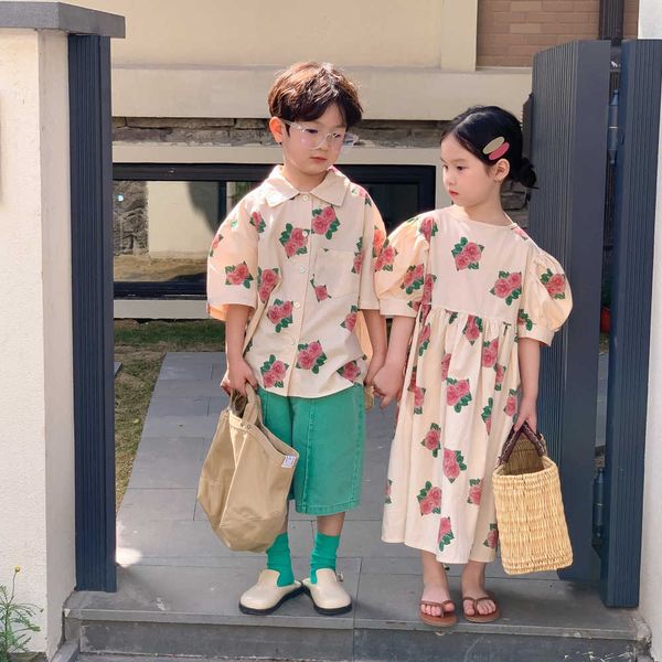 Giyim Setleri 2023 Yaz Çocukları Kardeş Kardeş Kore tarzı Gevşek Şakayık Baskılı Kızlar Elbise veya Erkek Gömlek Kıyafet Günlük Giysiler Y23