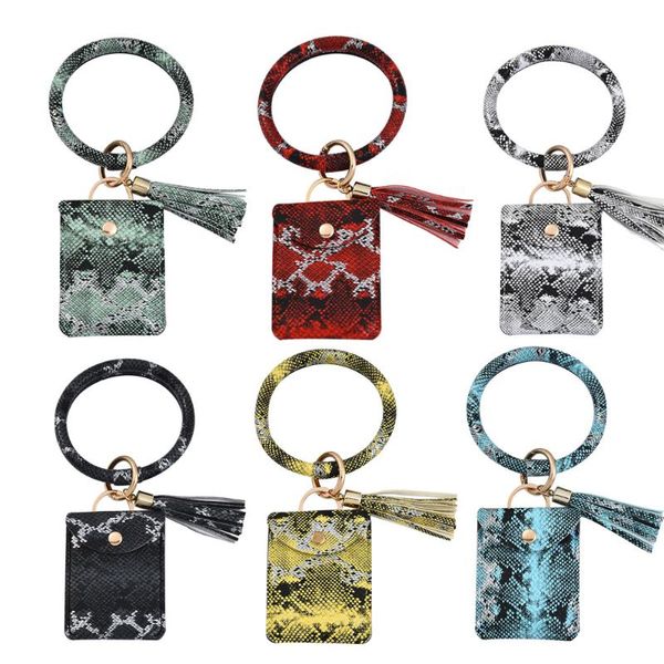 Клавные панк -запястье кольцо кожа кожа ключ цепь кошелек Serpentine Bracelet Bracelet Bulsemain Tassel Keyring Givering Dired