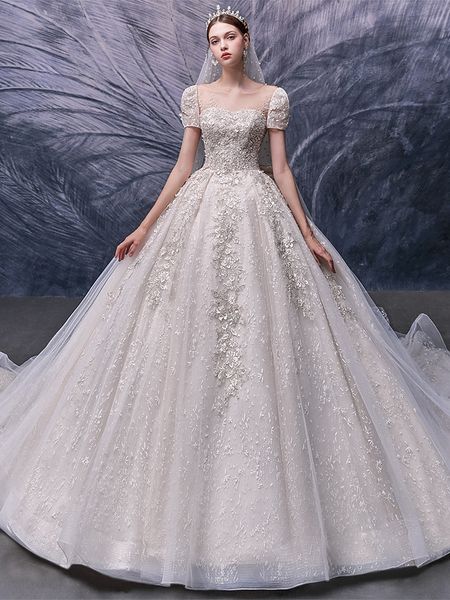 Abiti da sposa di lusso Maniche corte Appliques in pizzo Fiocco in rilievo Vita Arabia Saudita Scollo tondo Abiti da sposa principessa Elegante 2023