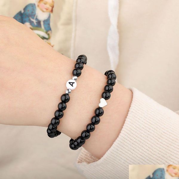 Perlen 6 mm schwarze Glasperlen Stränge Armband für Frauen Männer handgemachte elastische Acryl Brief flache Perle Charm Anhänger Armband Dhgarden Dhck4