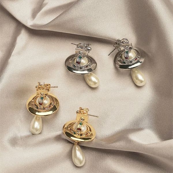 Design Planet Orecchini perlati a sospensione Saturno Pearl Stud Luce Orecchini da donna in stile Luxuria Love con una scatola di gioielli originale