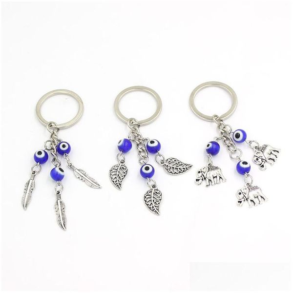 Portachiavi all'ingrosso Lucky Evil Eye Portachiavi Auto Ceramica Blue Feather Leaf Elephant Portachiavi per gioielli da donna Drop Delivery Otlap