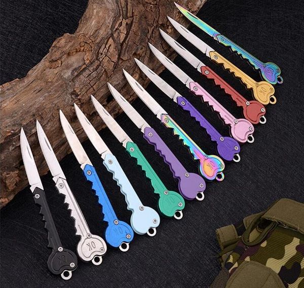 Keychains colhedos dobráveis ​​mini forma de coração de âmbito de defesa de defesa de bolso de sobrevivência ao ar livre Faca para mulheres Multicolor