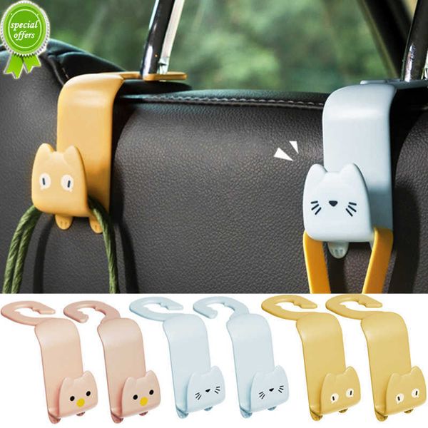 Novo 2pcs Creative Car Hook Cute Cat Carnece de assento Ganchos de acessórios para trás do assento Organizador de gancho de gancho Roupas de roupas de vestuário